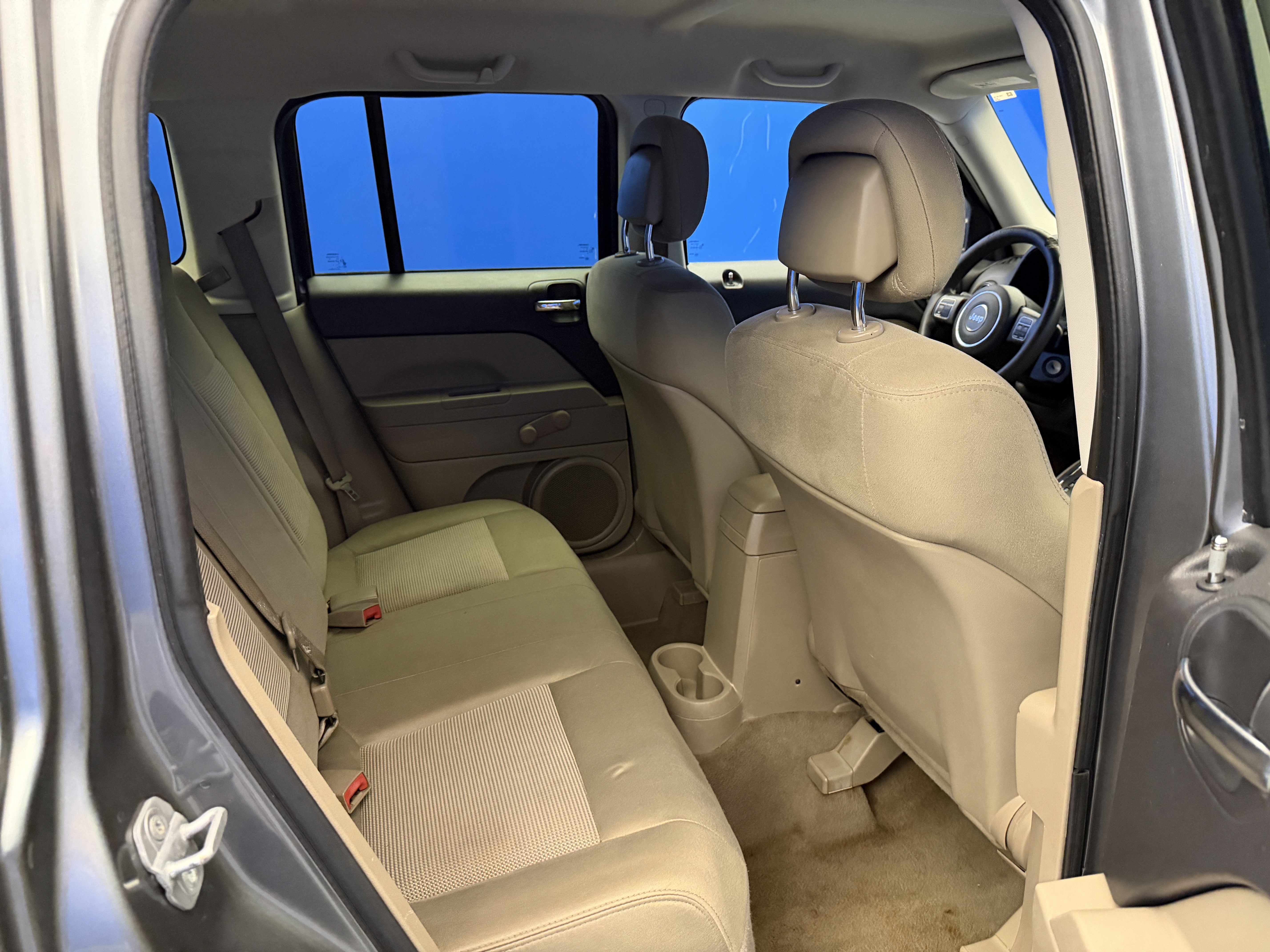 Used 2012 Mineral Gray Metallic Jeep Sport image 22