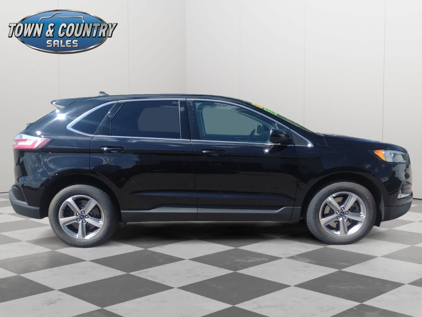 Used 2022 Agate Black Metallic Ford SEL image 8