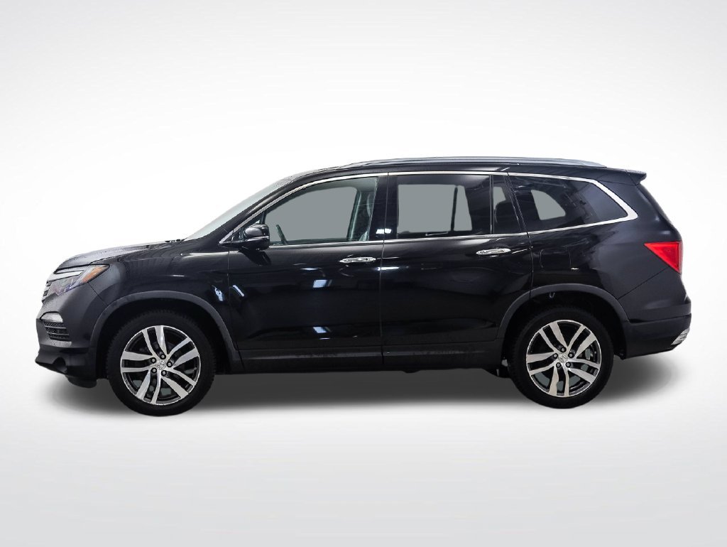 Used 2018 Honda Pilot Touring with VIN 5FNYF6H94JB004093 for sale in Minneapolis, Minnesota