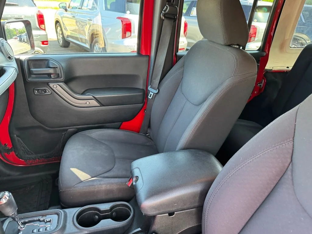 Used 2014 Red Jeep Unlimited Sport image 7