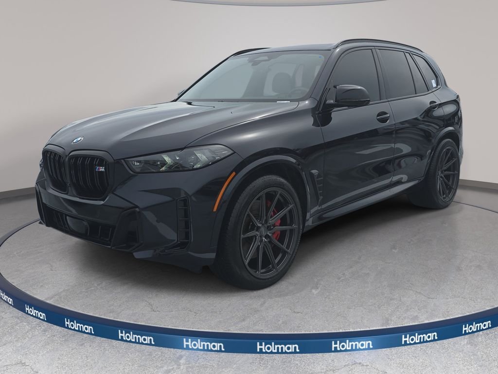 Certified Used 2025 Carbon Black Metallic BMW M60i image 1
