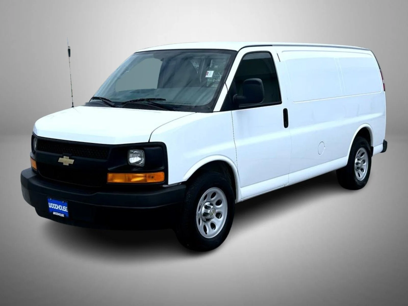 Used 2014 White Chevrolet Work Van image 1