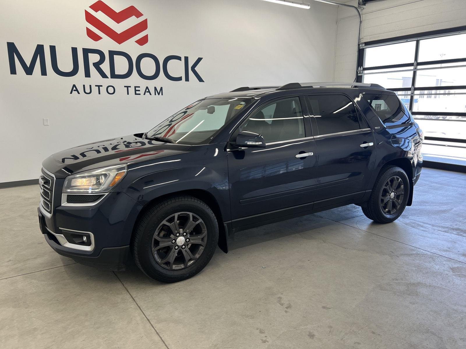 Used 2015 Dark Sapphire Blue Metallic GMC SLT image 1