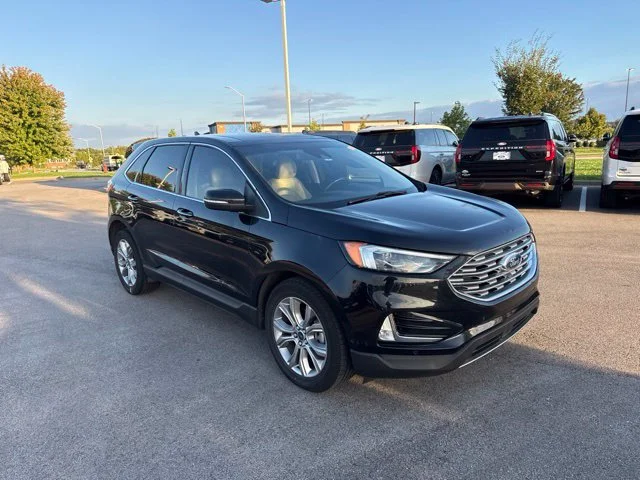 Used 2019 Agate Black Metallic Ford Titanium image 1