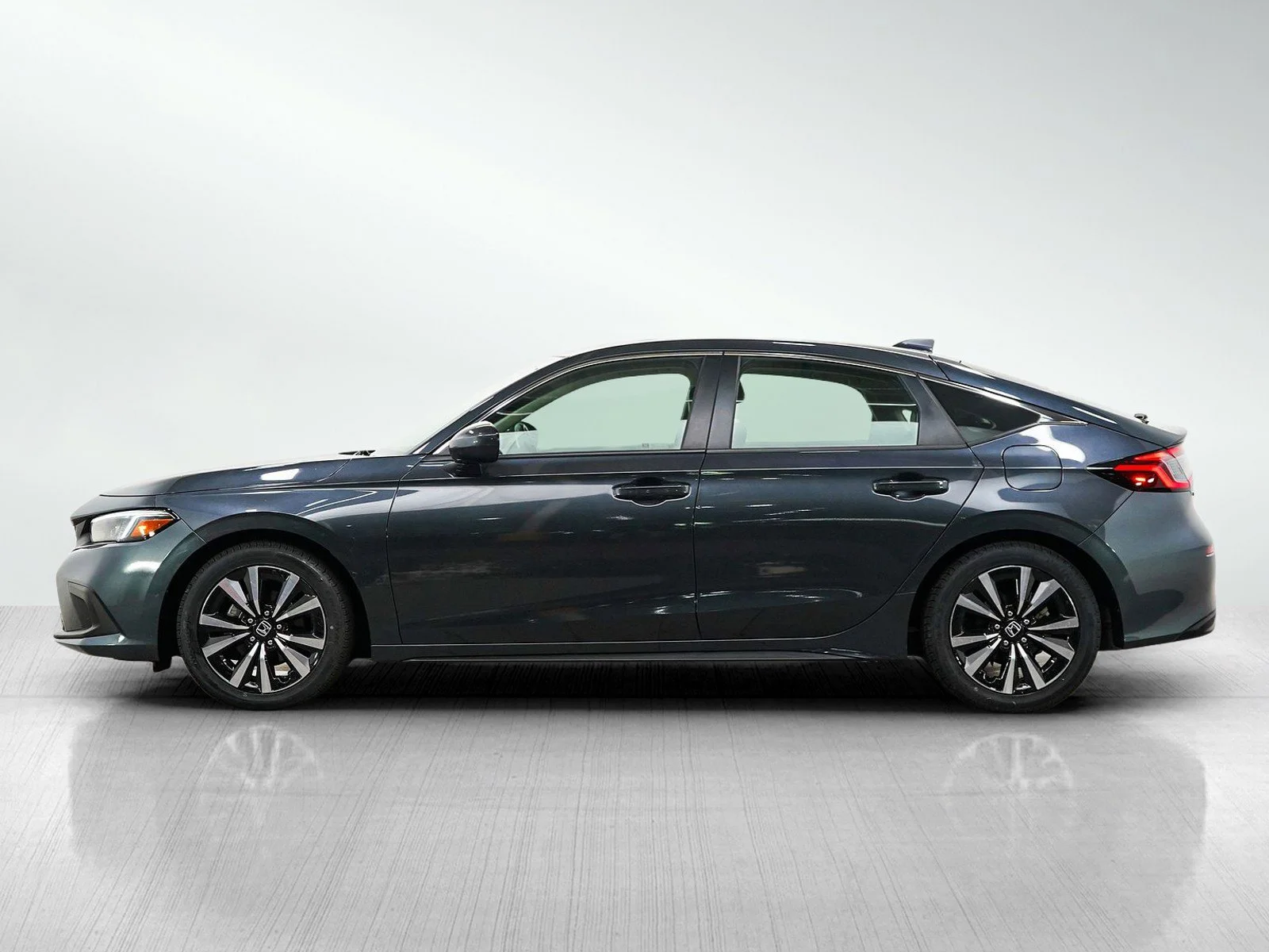 Used 2024 Honda Civic Hatchback EX-L with VIN 19XFL1H7XRE003209 for sale in Hopkins, Minnesota