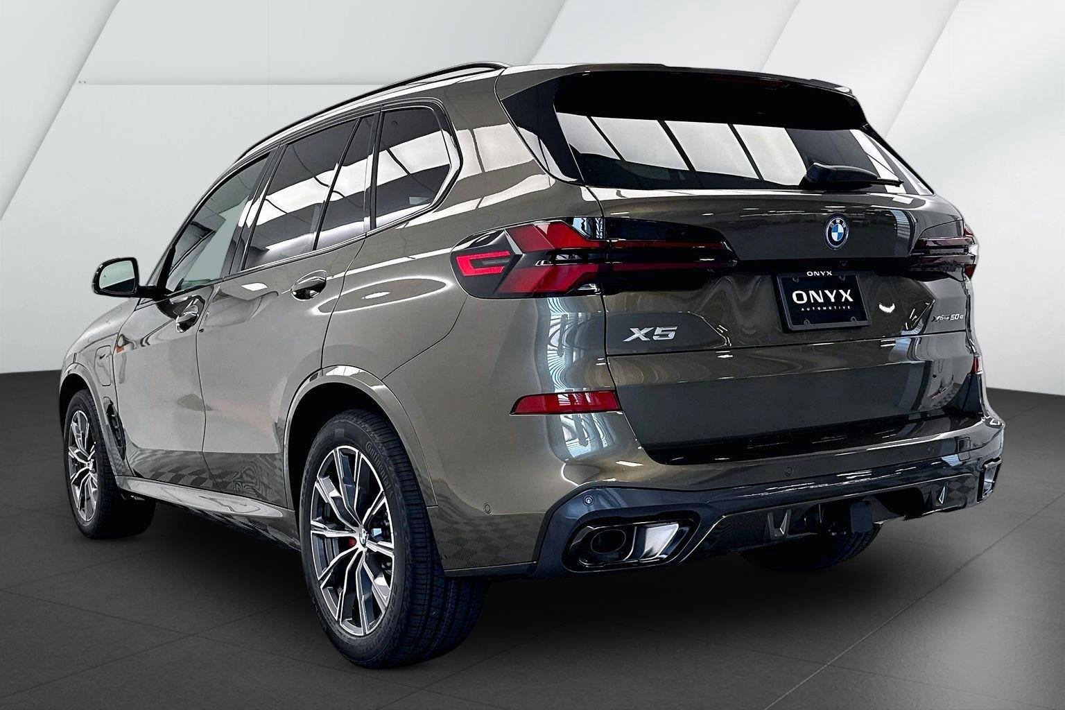 New 2026 Manhattan Green Metallic BMW xDrive50e image 9
