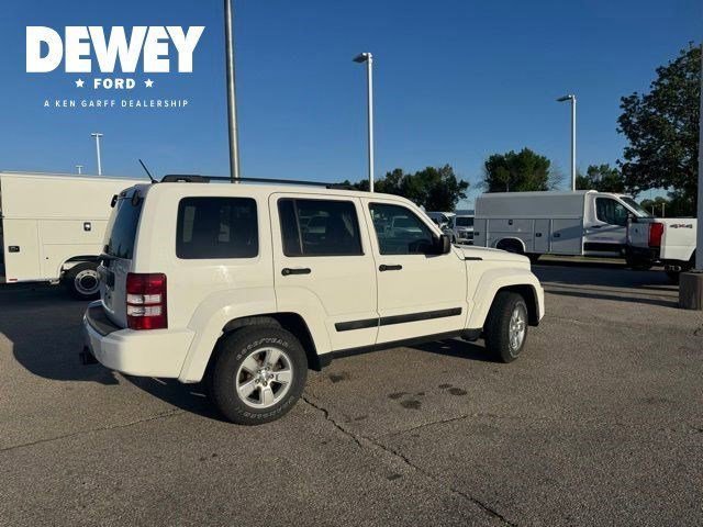 Used 2012 Bright White Jeep Sport image 14