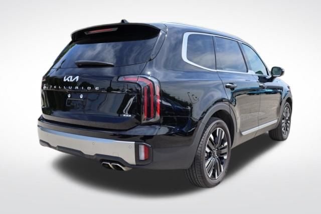 Used 2025 Ebony Black Kia SX-Prestige image 11