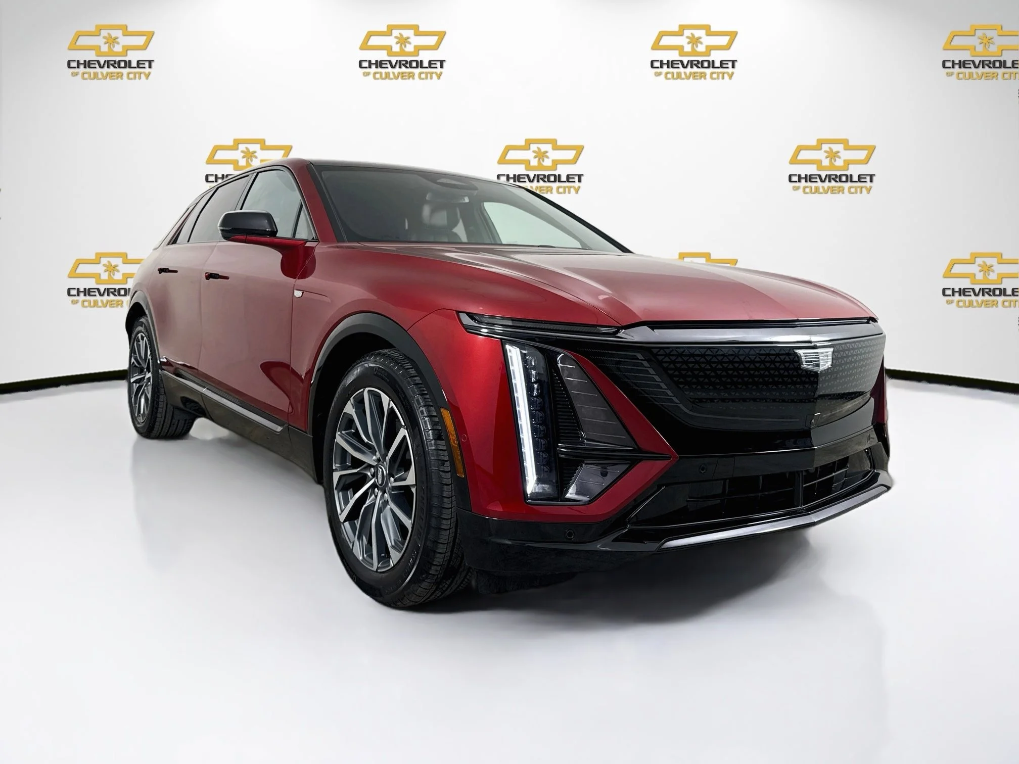 Used 2025 Radiant Red Tintcoat Cadillac Sport 1 image 1