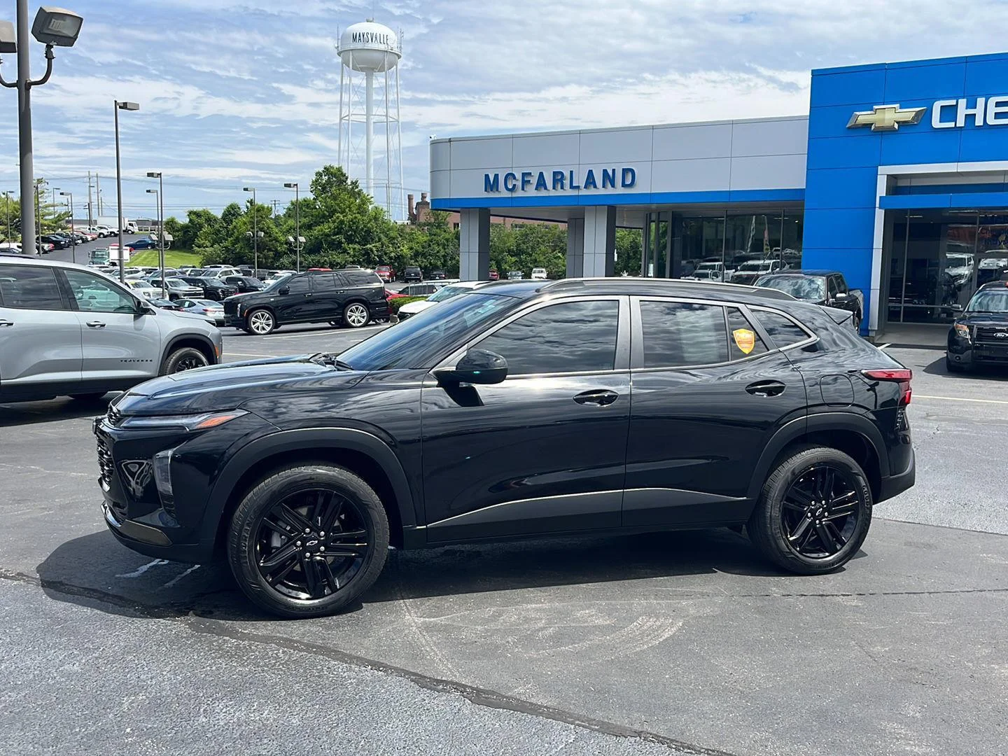 Used 2024 Mosaic Black Metallic Chevrolet ACTIV image 2