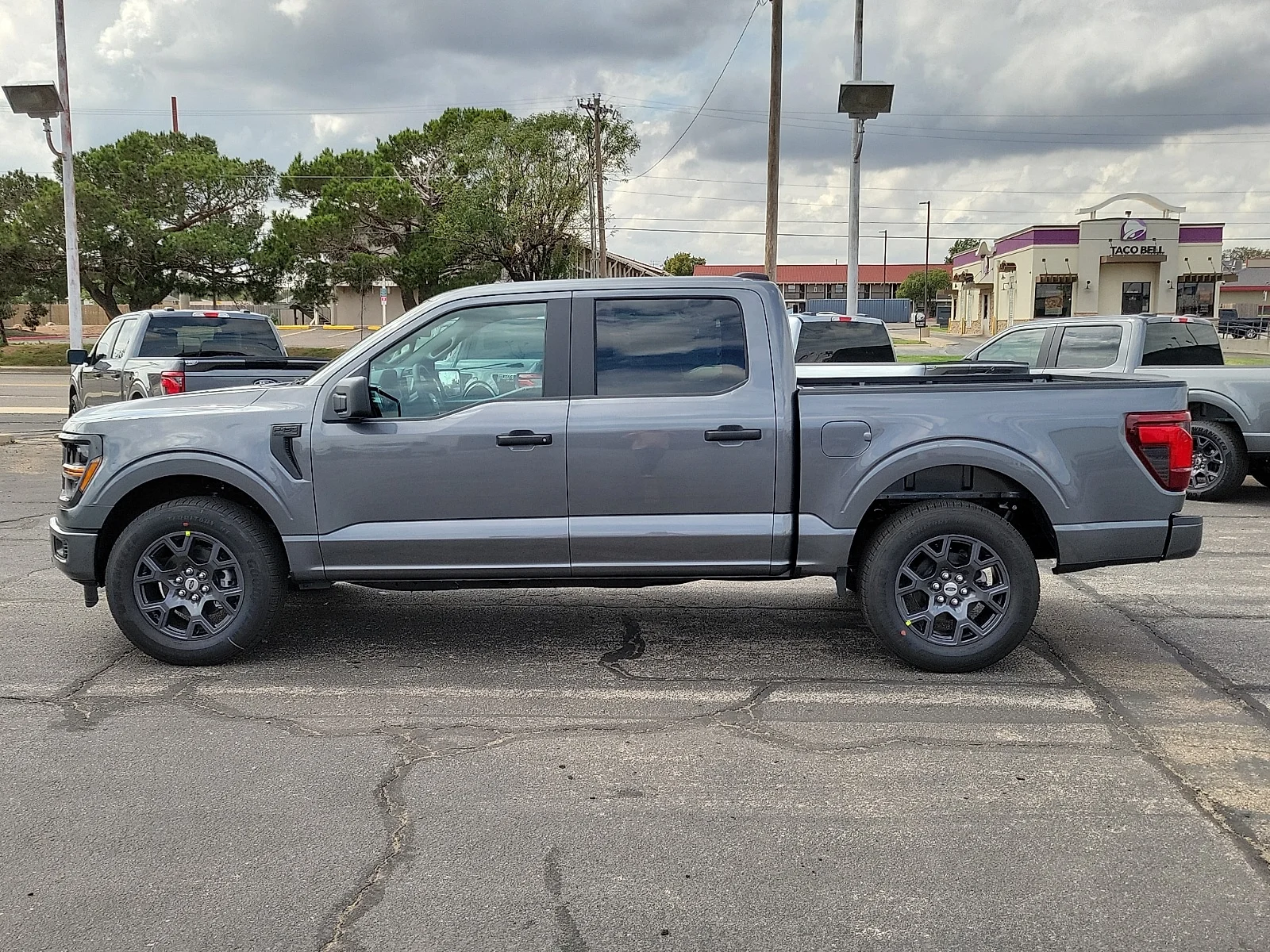 New 2026 Carbonized Gray Metallic Ford STX&reg; image 2