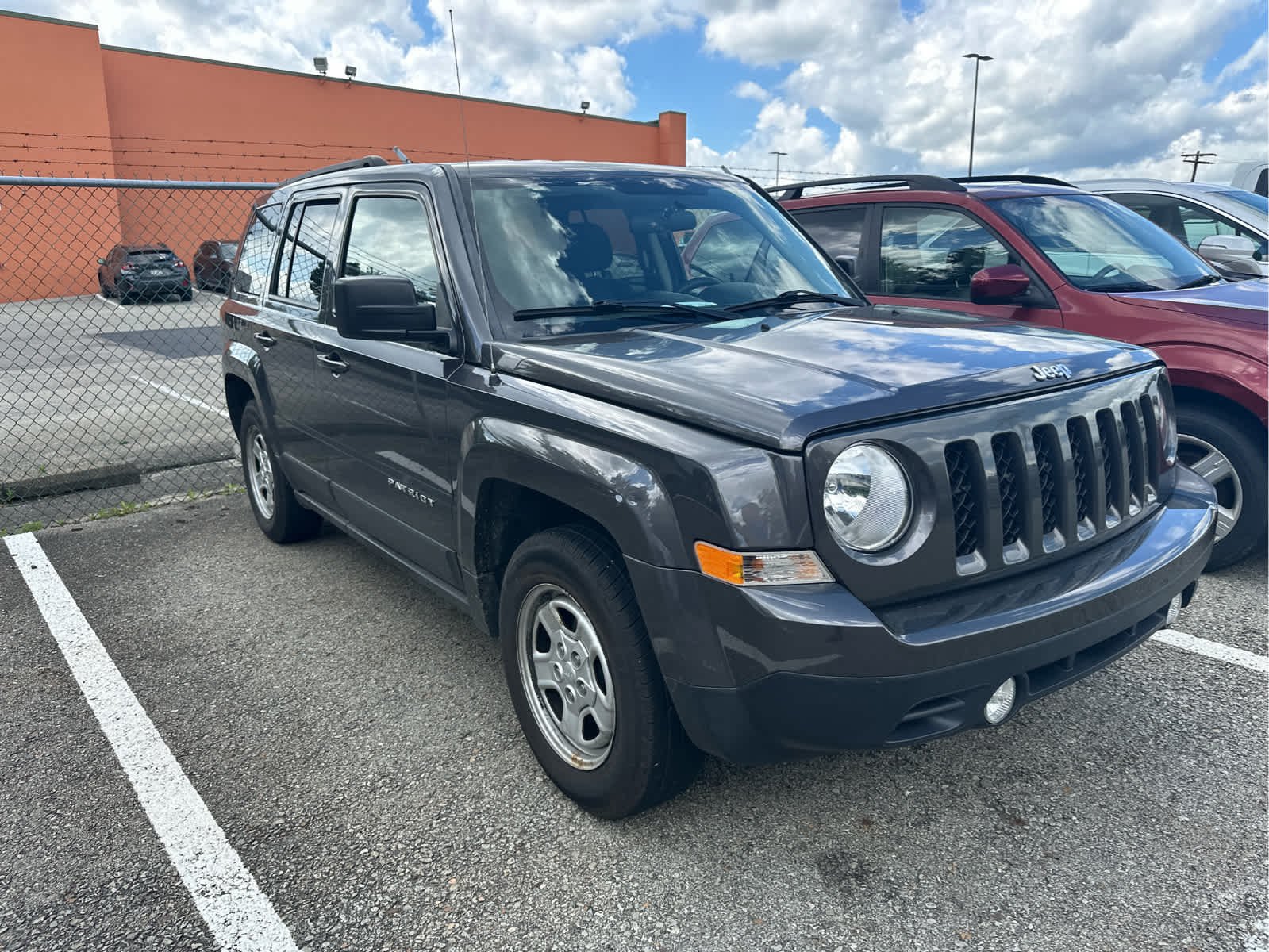 Used 2015 Granite Crystal Metallic Clearcoat Jeep Sport image 2