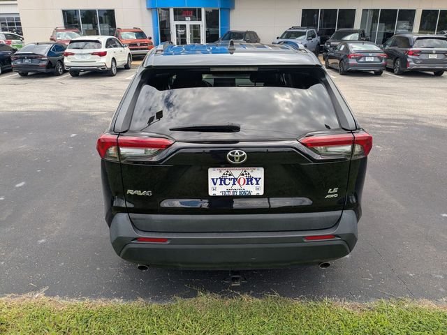 Used 2021 Midnight Black Metallic Toyota LE image 8