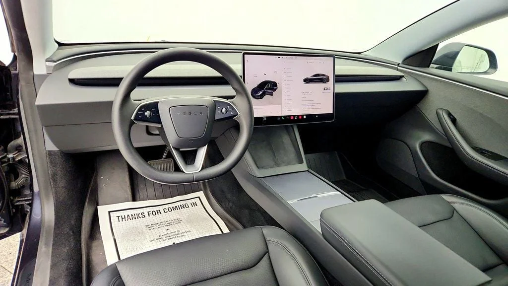 Used 2025 Stealth Grey Tesla Long Range RWD image 12