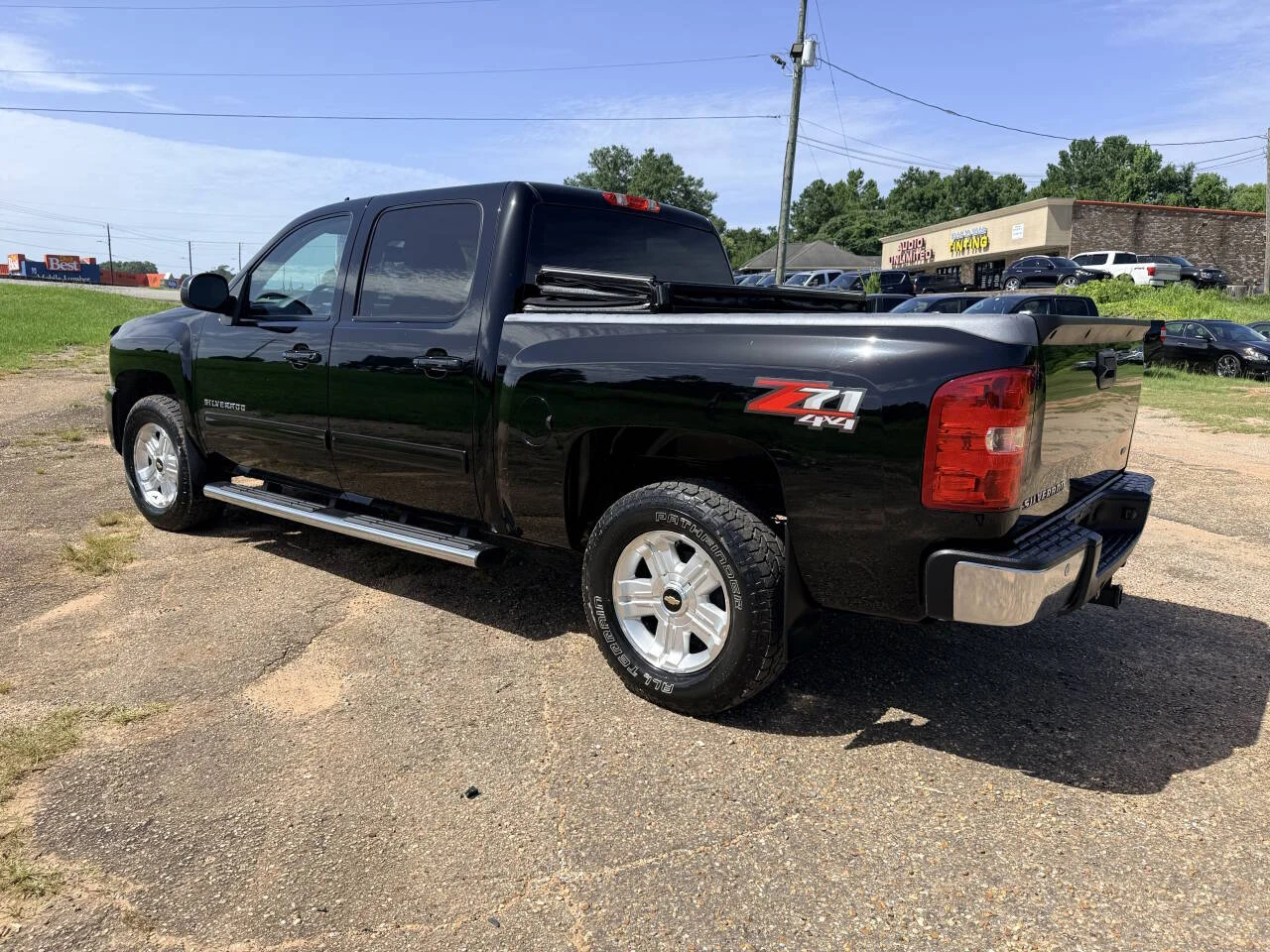 Used 2013 Black Chevrolet LTZ 4x4 4dr Crew Cab 5.8 ft. SB image 3