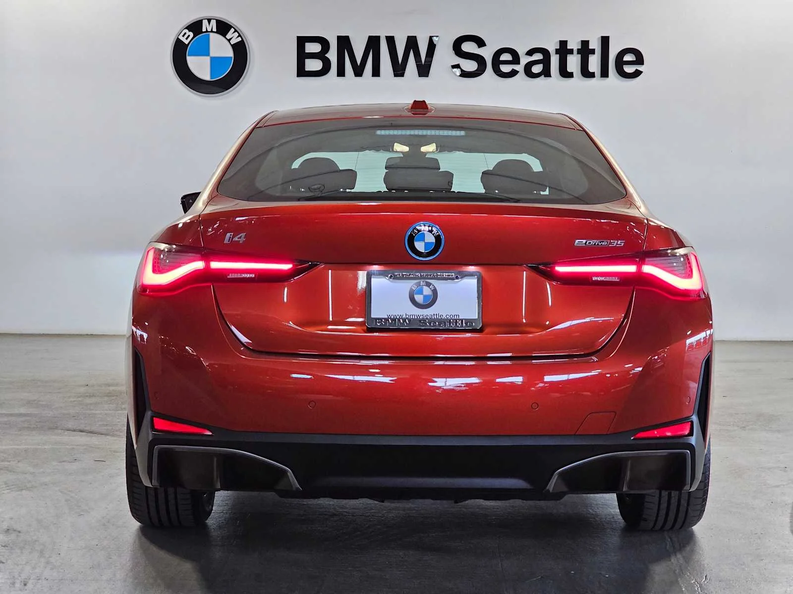 Certified Used 2023 Sunset Orange Metallic BMW eDrive35 image 5