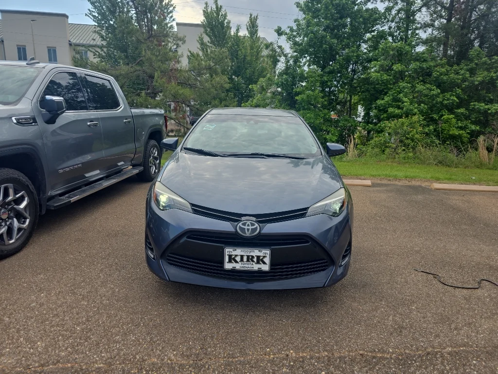 Used 2017 Toyota Corolla LE with VIN 5YFBURHE5HP570837 for sale in Grenada, MS