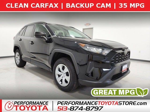 Used 2020 Midnight Black Metallic Toyota LE image 1