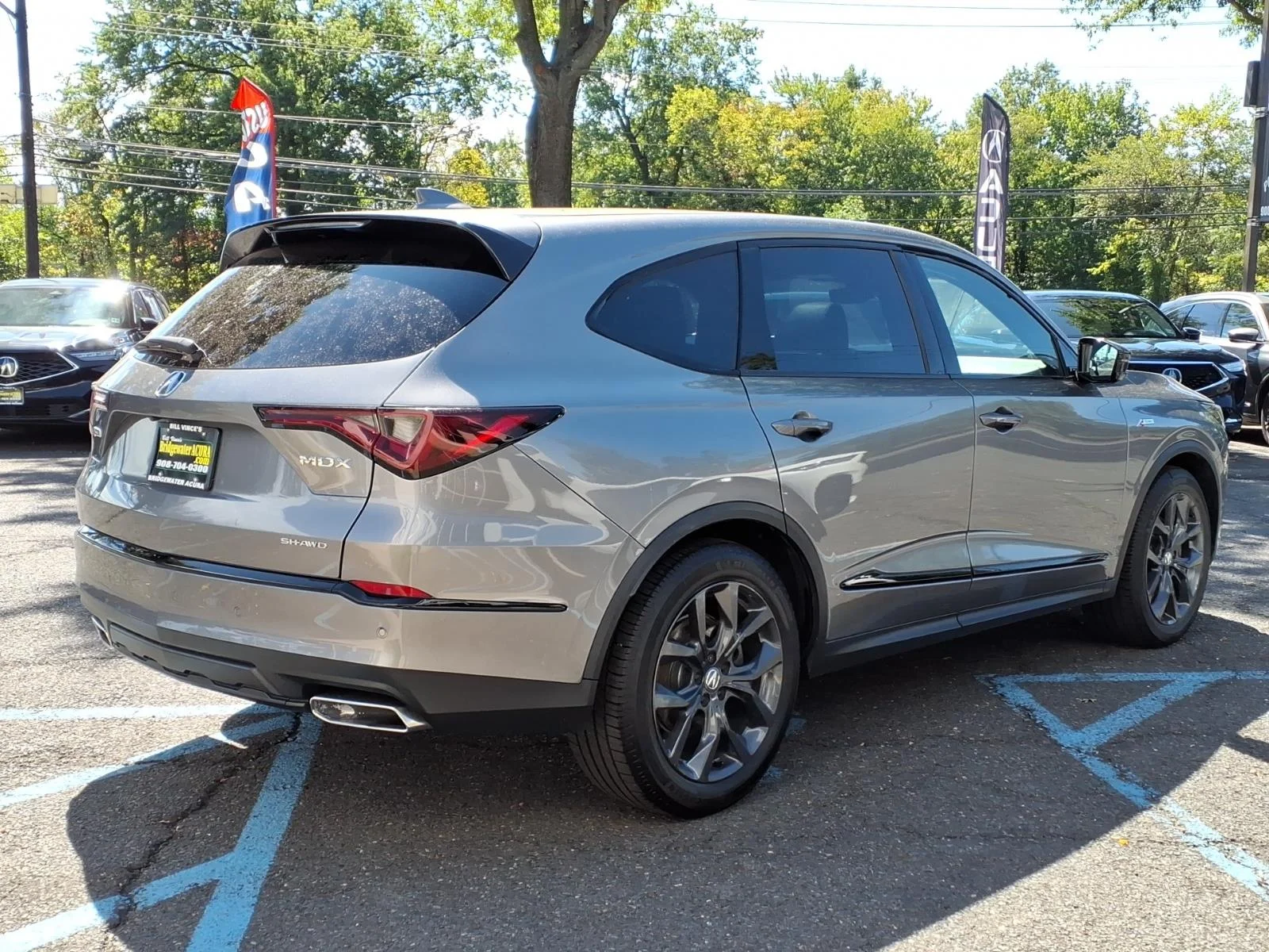 Used 2023 Liquid Carbon Metallic Acura SH-AWD with A-Spec Package image 4