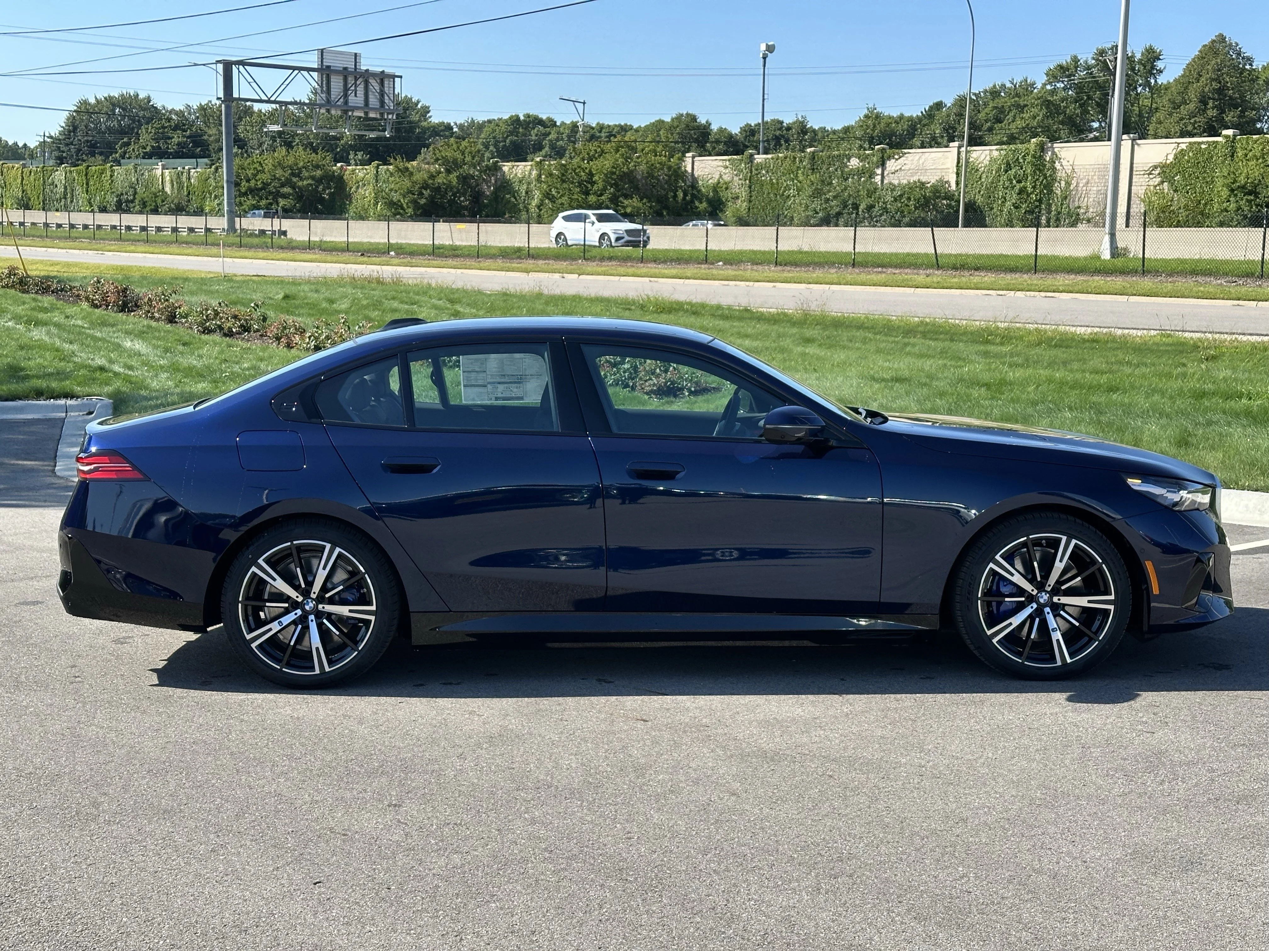 New 2026 Tanzanite Blue II Metallic BMW 550e xDrive image 8