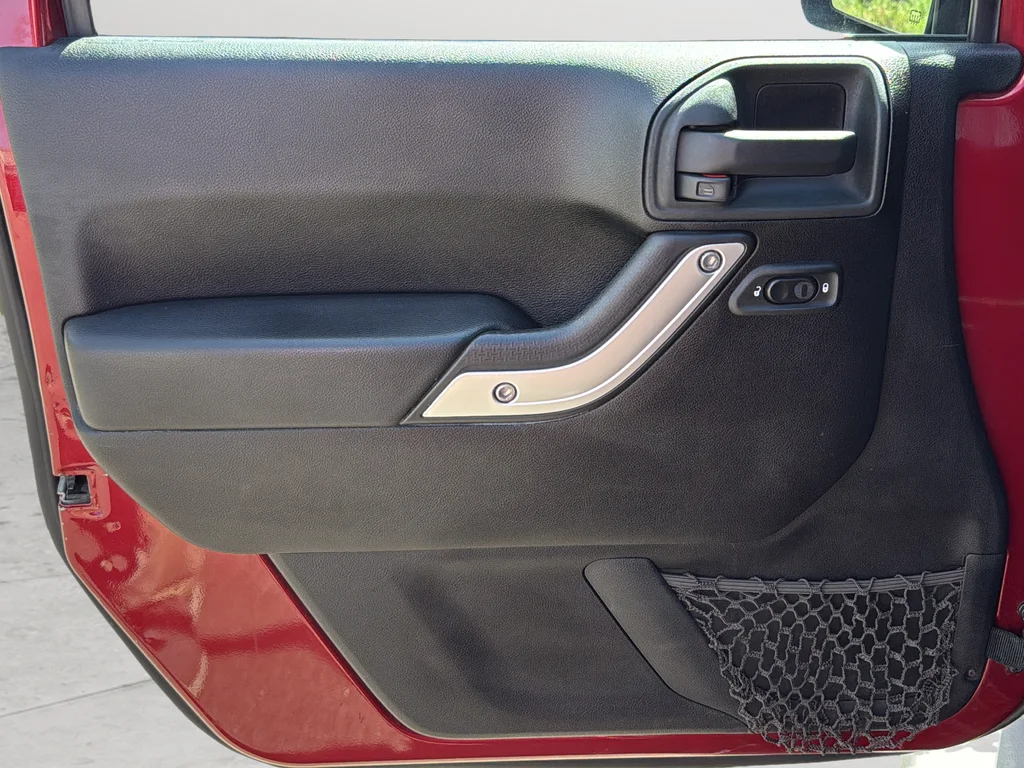Used 2012 Red Jeep Unlimited Sahara image 23