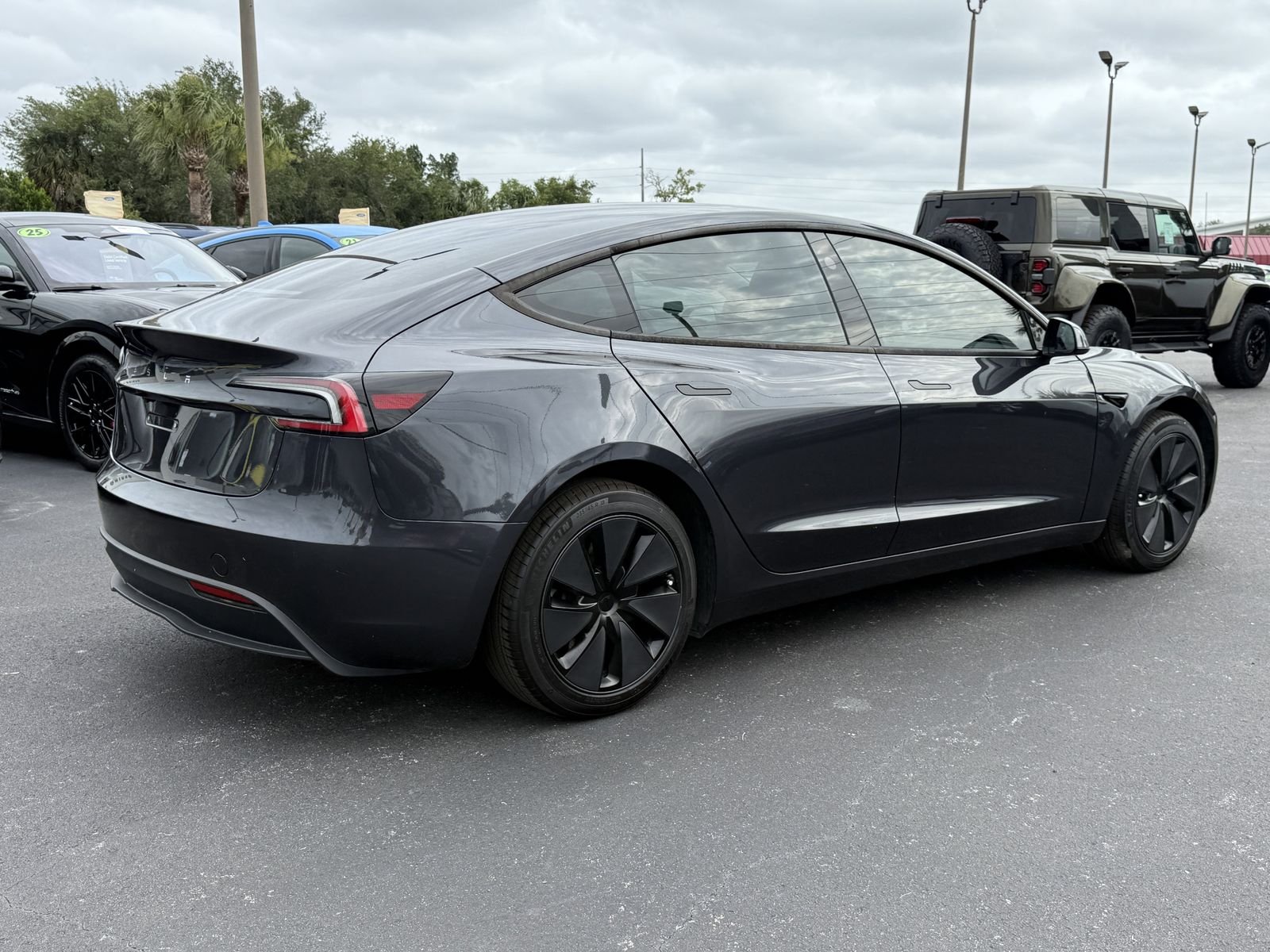 Used 2025 Stealth Gray Tesla Long Range image 4