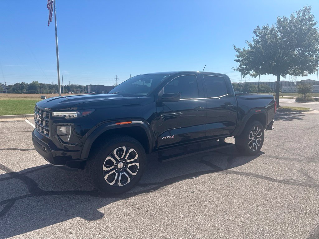 Used 2024 Black GMC AT4 image 1