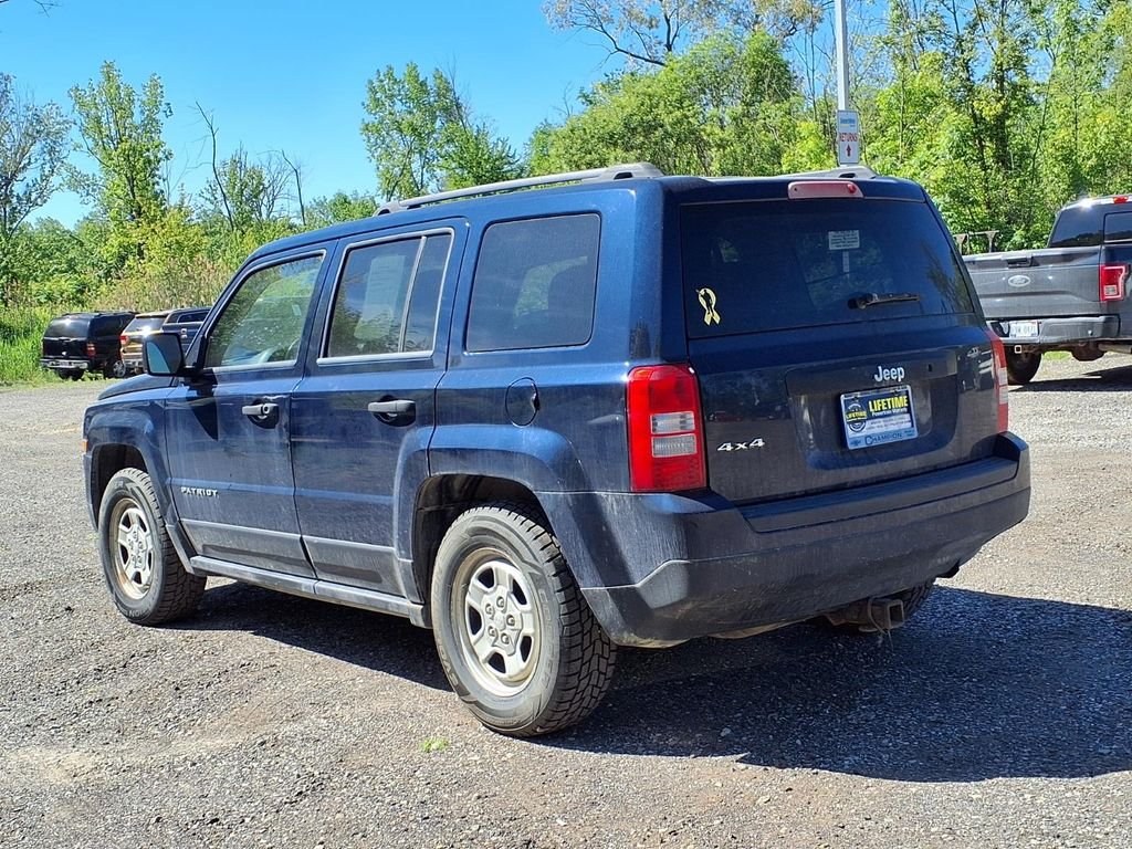 Used 2014 Blue Jeep Sport image 6