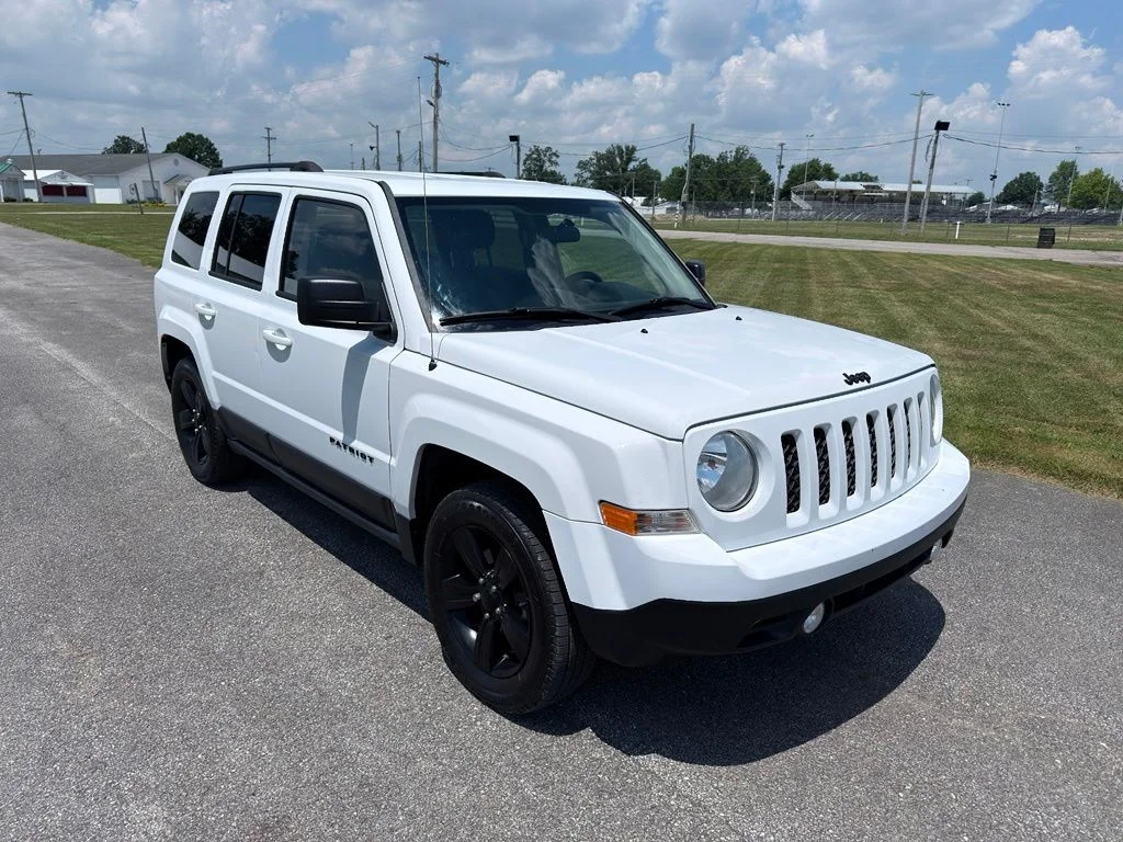 Used 2015 White Jeep Sport image 2