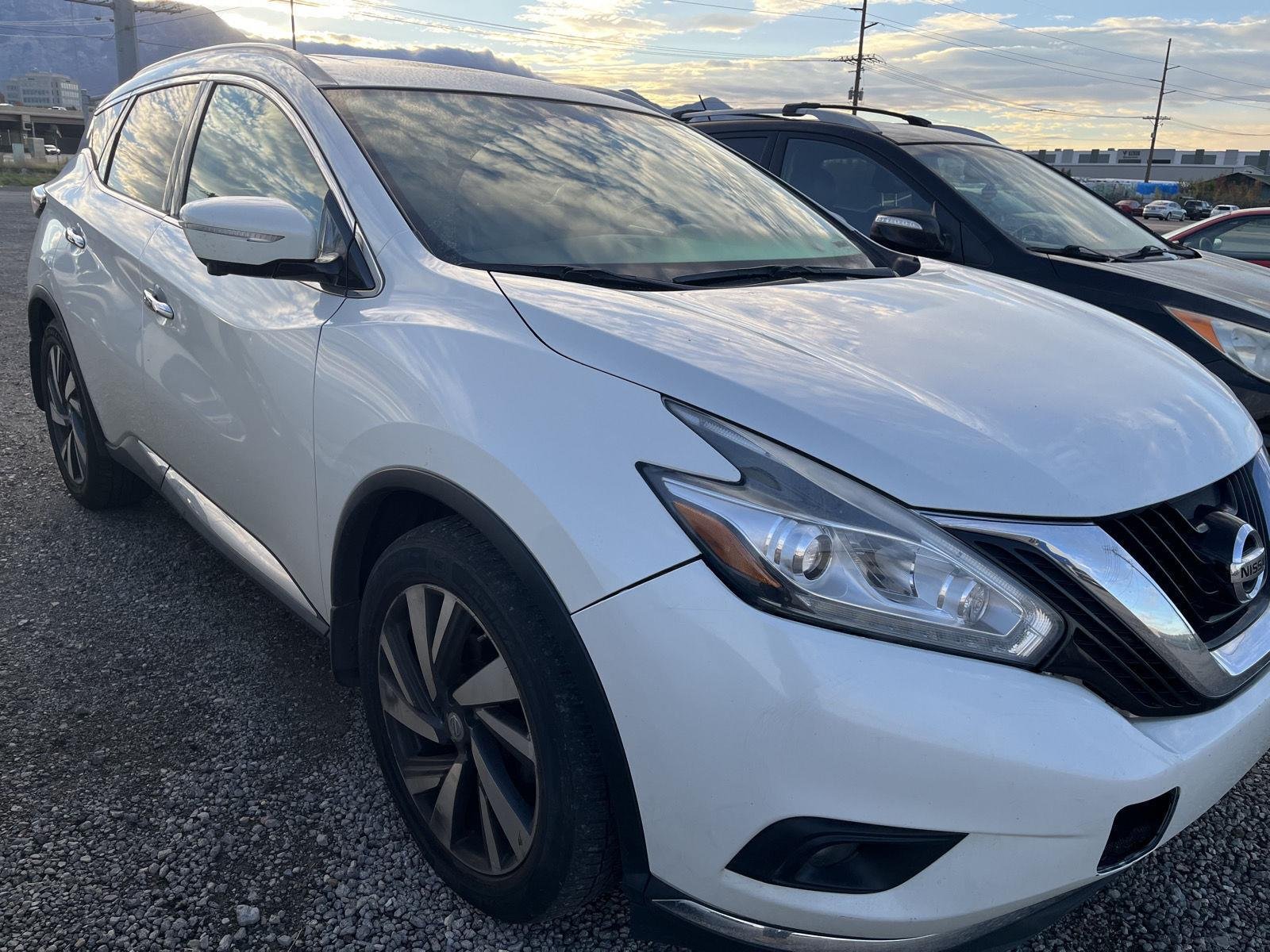Used 2015 Pearl White Nissan Platinum image 3