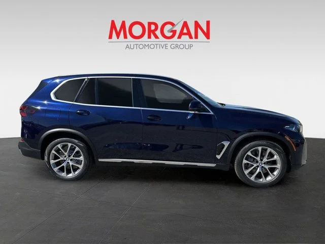 New 2026 Tanzanite Blue II Metallic BMW xDrive50e image 3