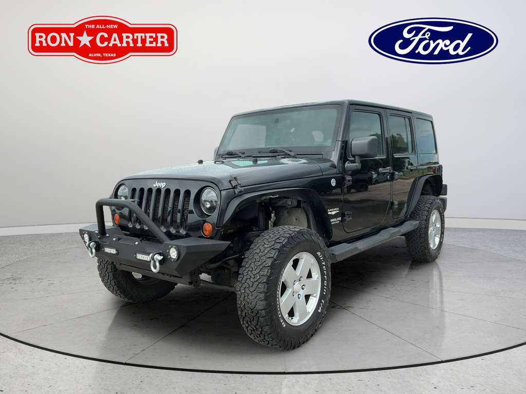 Used 2012 Black Clearcoat Jeep Unlimited Sahara image 3