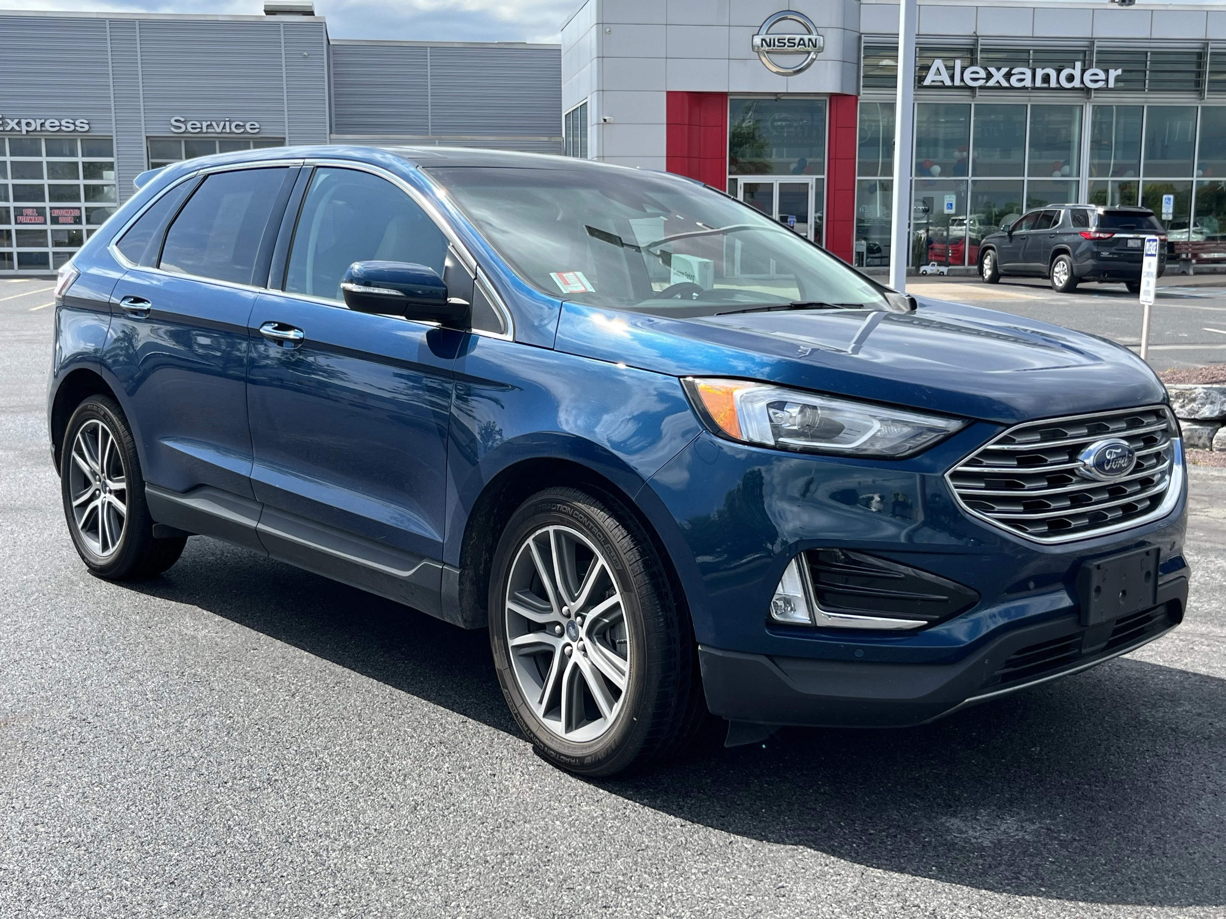 Used 2020 Green Metallic Ford Titanium image 1