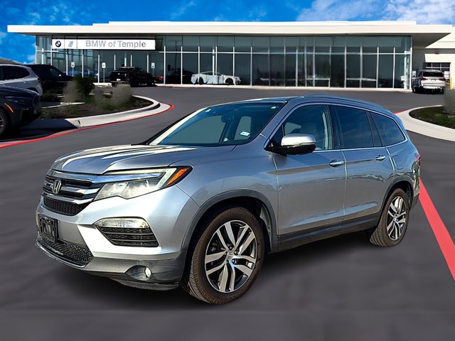 Pre-Owned 2016 Honda Pilot 3.5L V-6 gasoline direct injection, i-VTEC VCM variable valve control, regular unleaded, engine with cylinder deactivation and 280HP FWD Touring