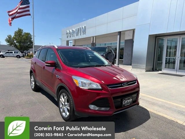 Used 2016 Red Ford Titanium image 1
