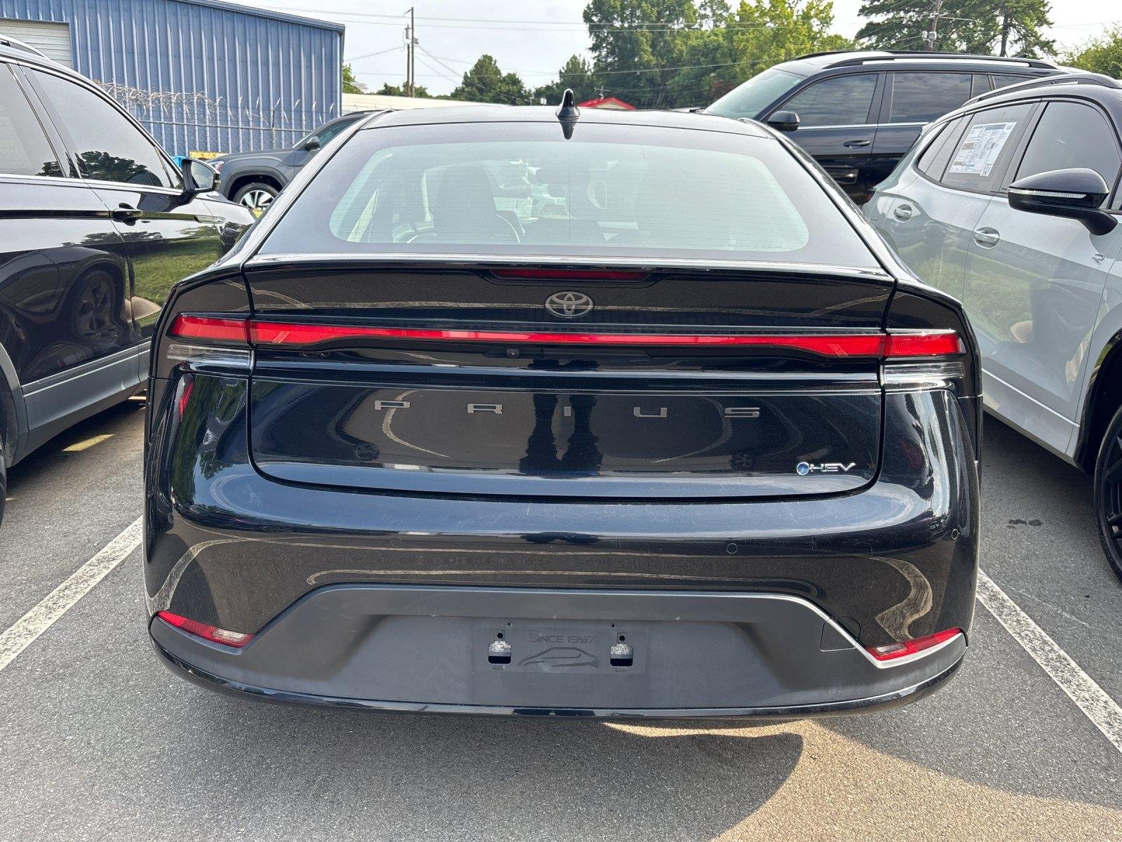 Used 2023 Midnight Black Metallic Toyota LE image 4