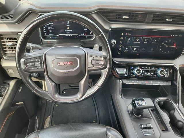 Used 2024 Summit White GMC AT4 4x4 Crew Cab 5.75 ft. box 147.4 in. WB image 26