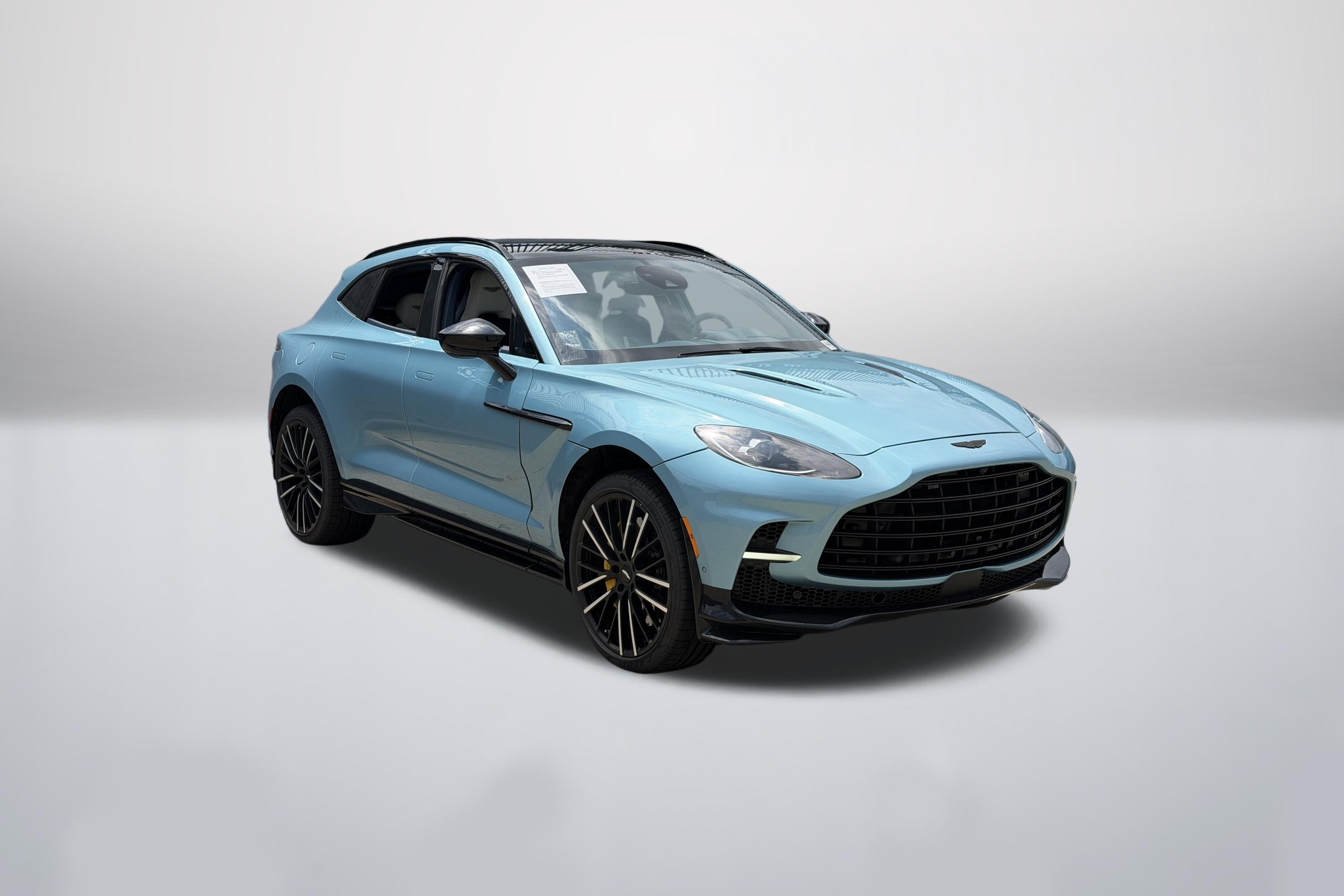 Used 2023 Caribbean Blue Aston Martin 707 image 1