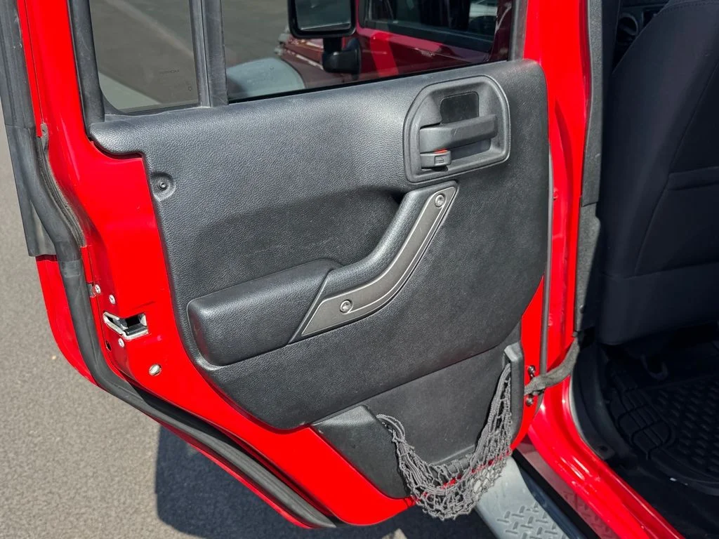 Used 2014 Red Jeep Unlimited Sport image 13