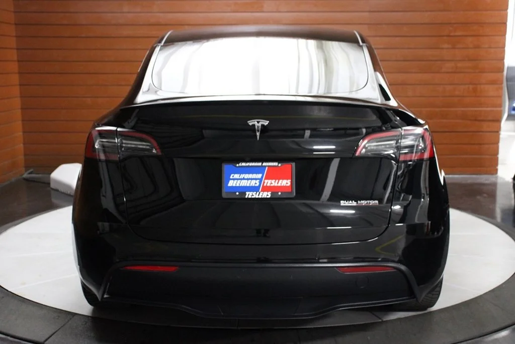 Used 2022 Solid Black Tesla Performance image 6
