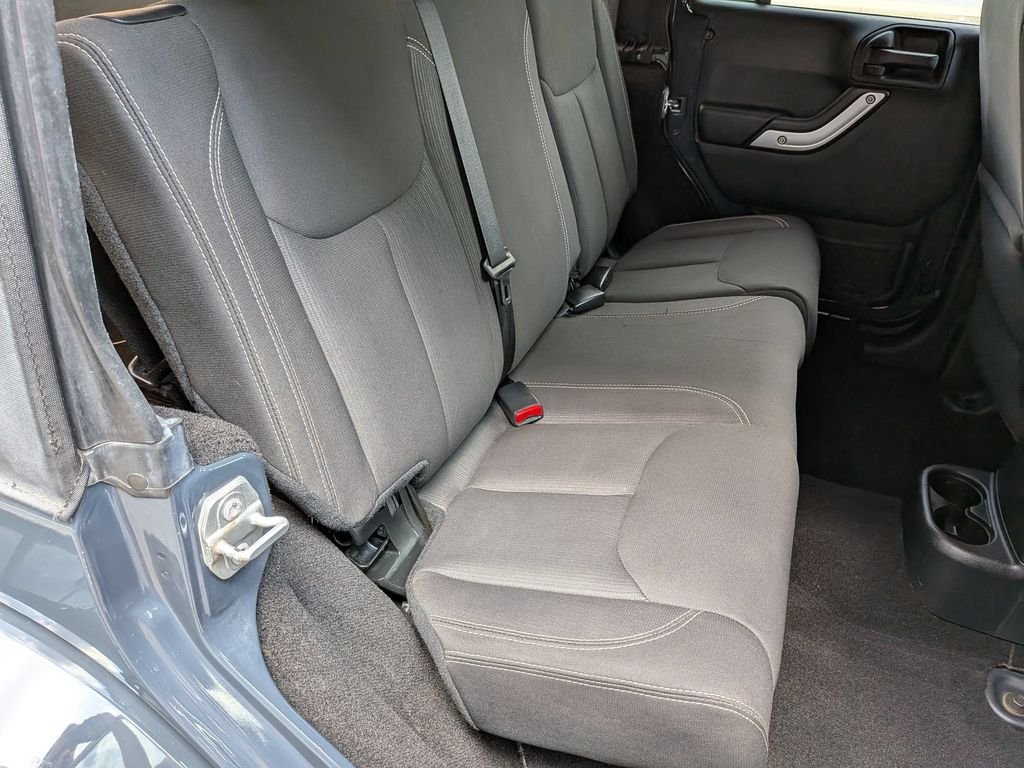 Used 2016 Black Jeep Unlimited Sahara image 20