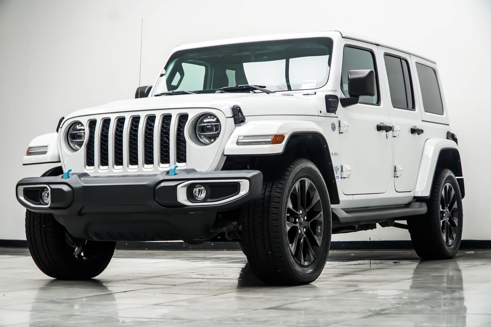 Used 2021 White Jeep Unlimited Sahara 4xe image 11