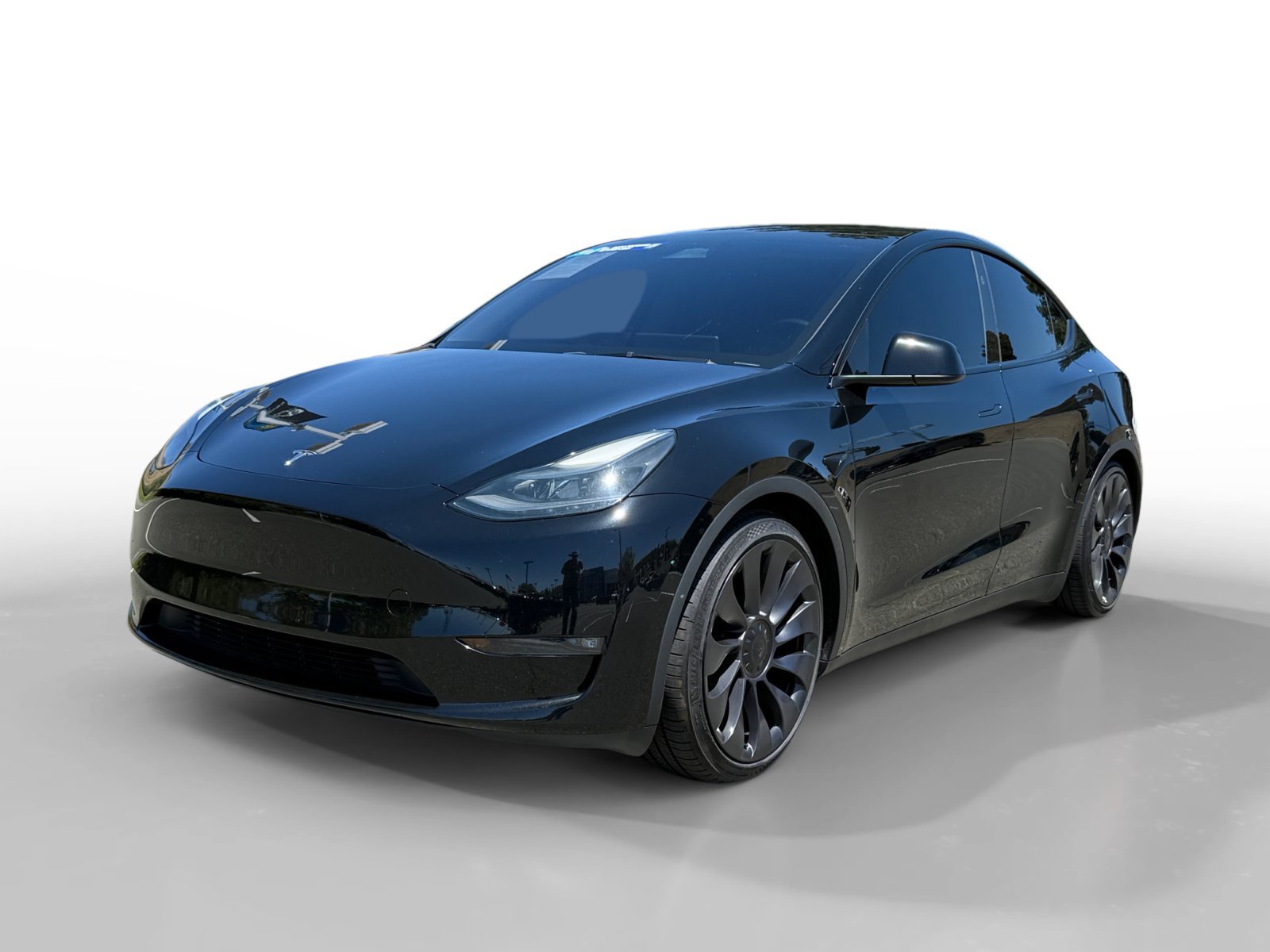 Used 2024 Solid Black Tesla Performance image 1