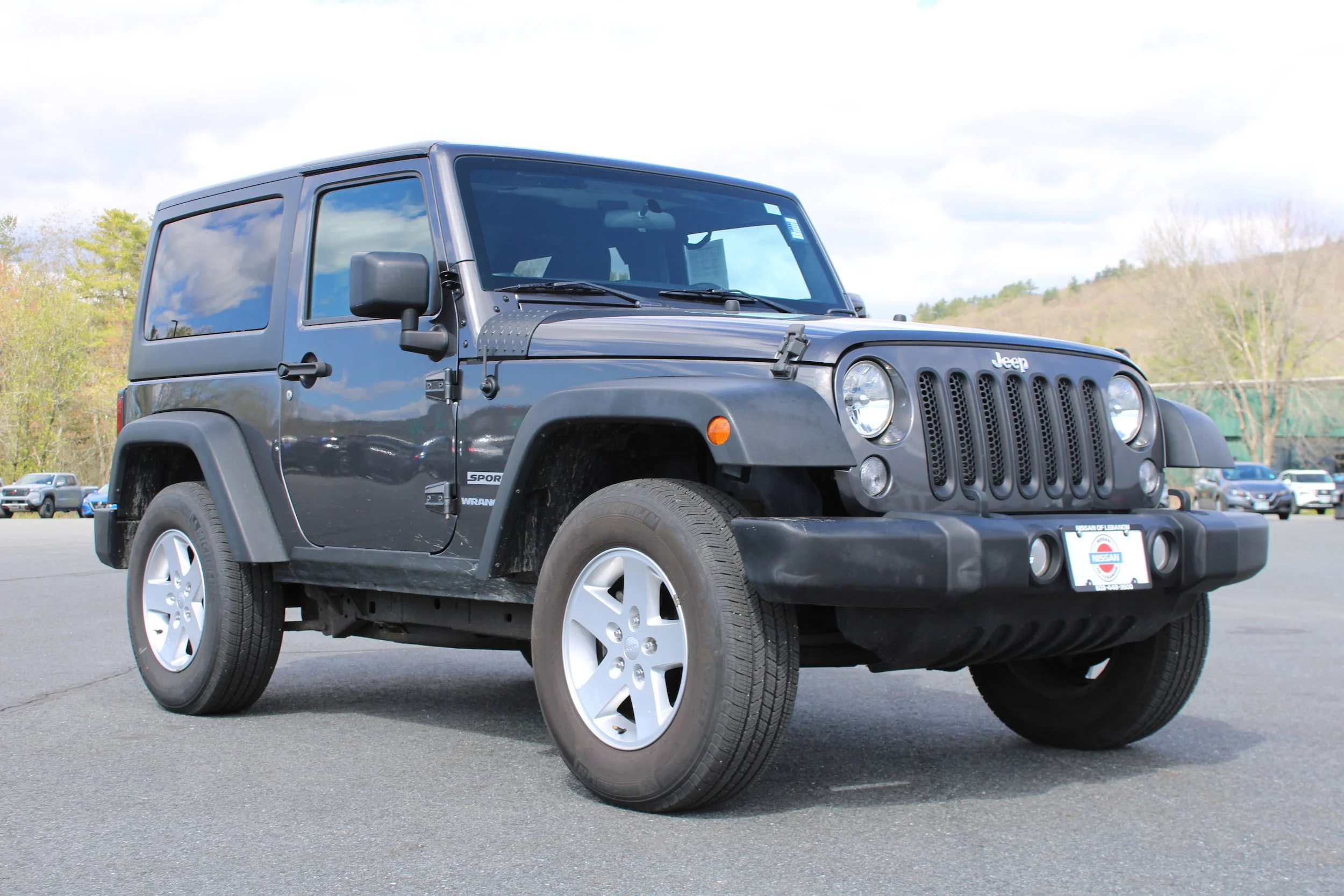 Used 2017 Granite Crystal Metallic Clearcoat Jeep Sport image 7