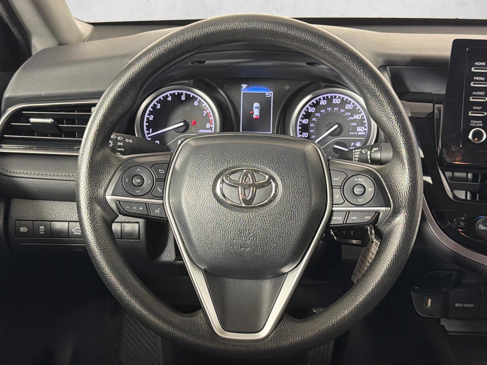 Used 2024 Reservoir Blue Toyota LE image 23