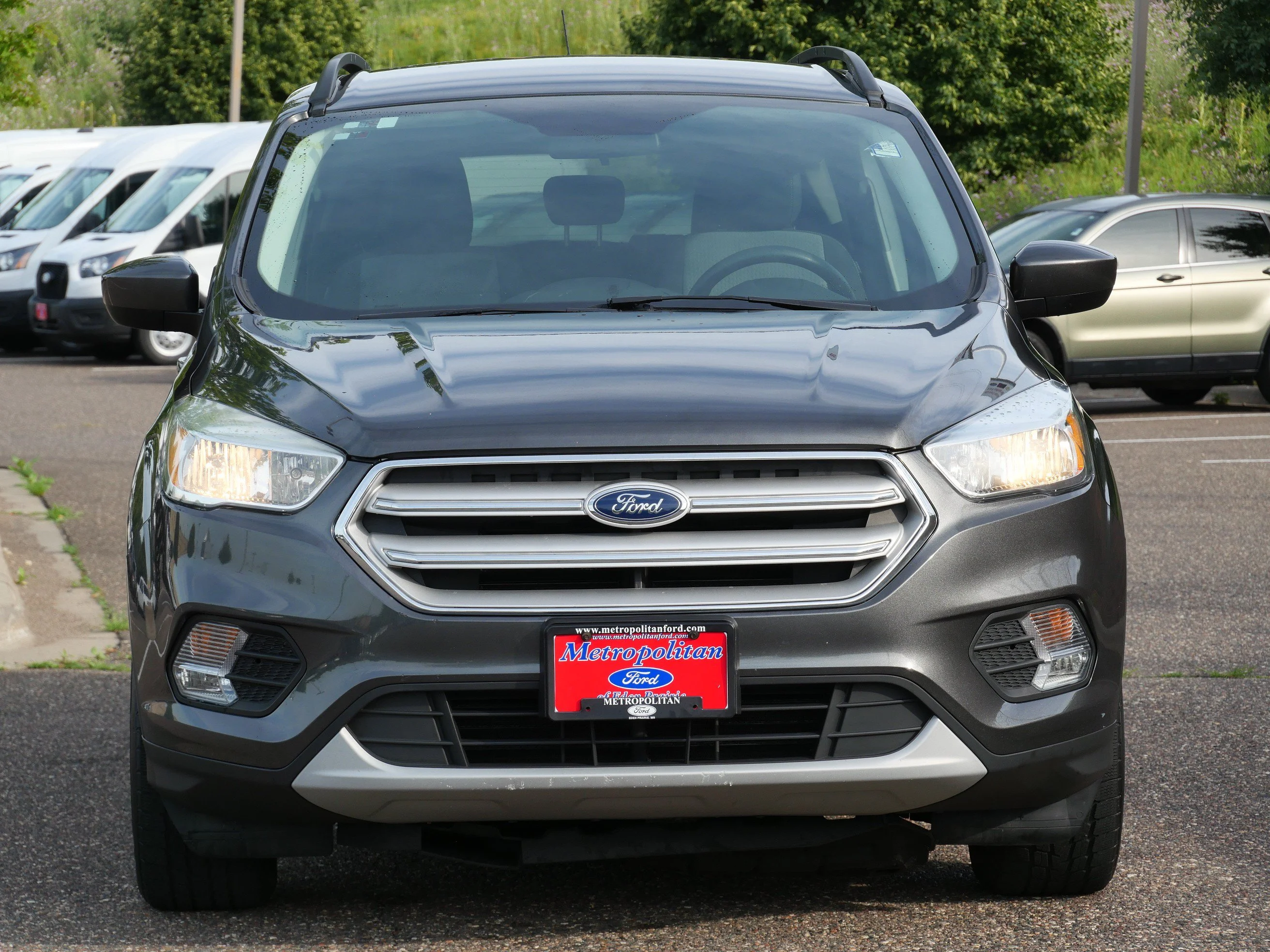 Used 2018 Ford Escape SE with VIN 1FMCU9GD7JUA85648 for sale in Eden Prairie, Minnesota