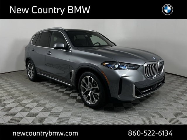 Used 2026 Skyscraper Grey Metallic BMW xDrive50e image 1