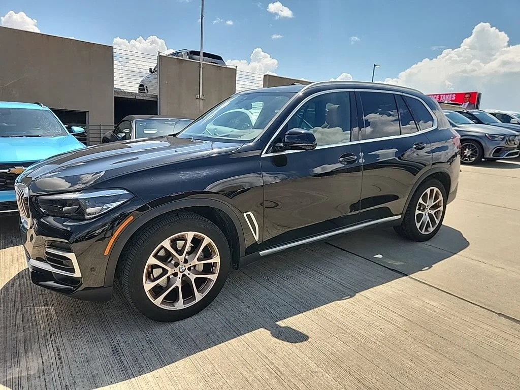 Certified Used 2023 Jet Black BMW xDrive40i image 1