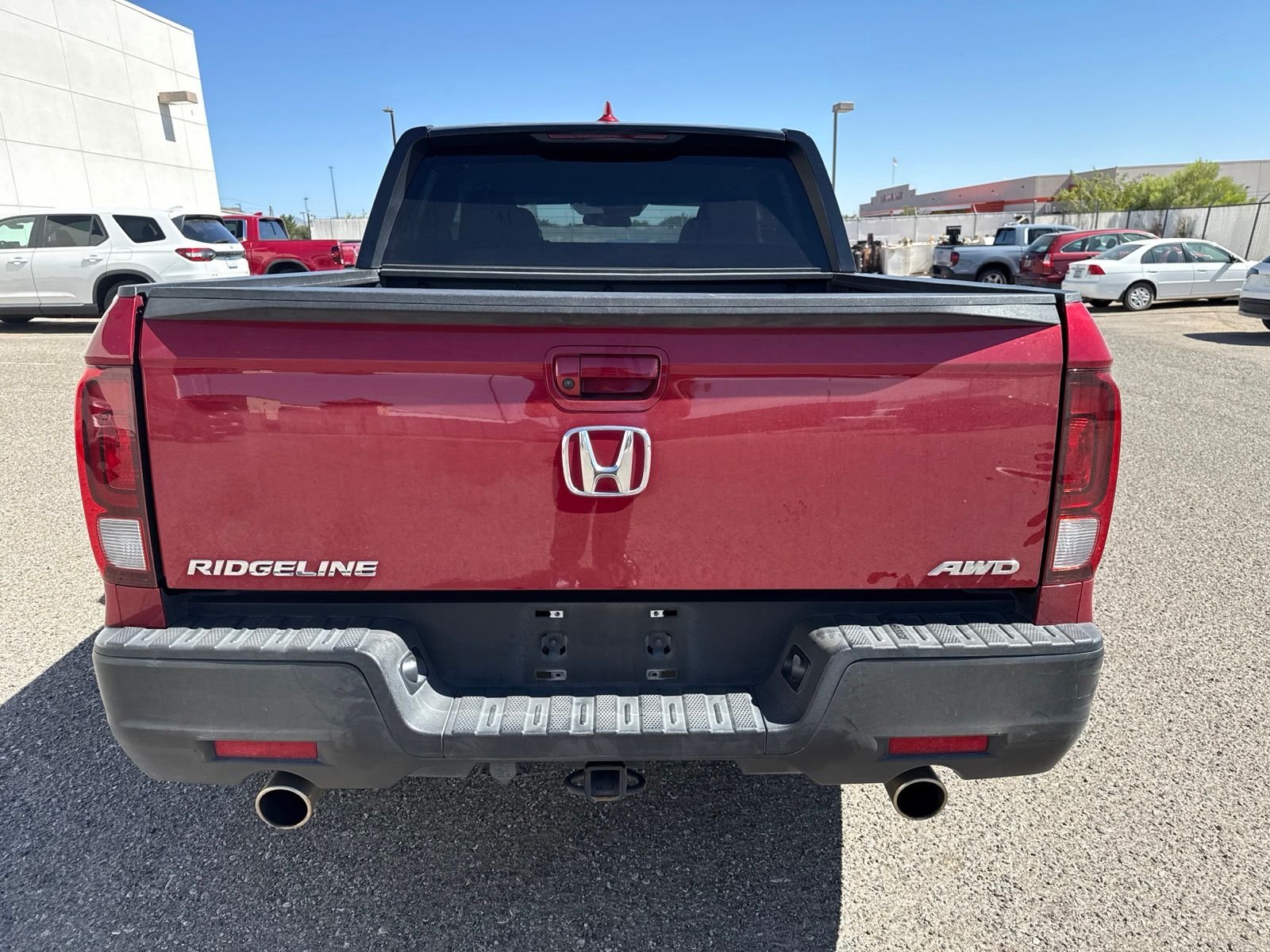 Certified Used 2021 Radiant Red Metallic II Honda AWD SPORT image 4