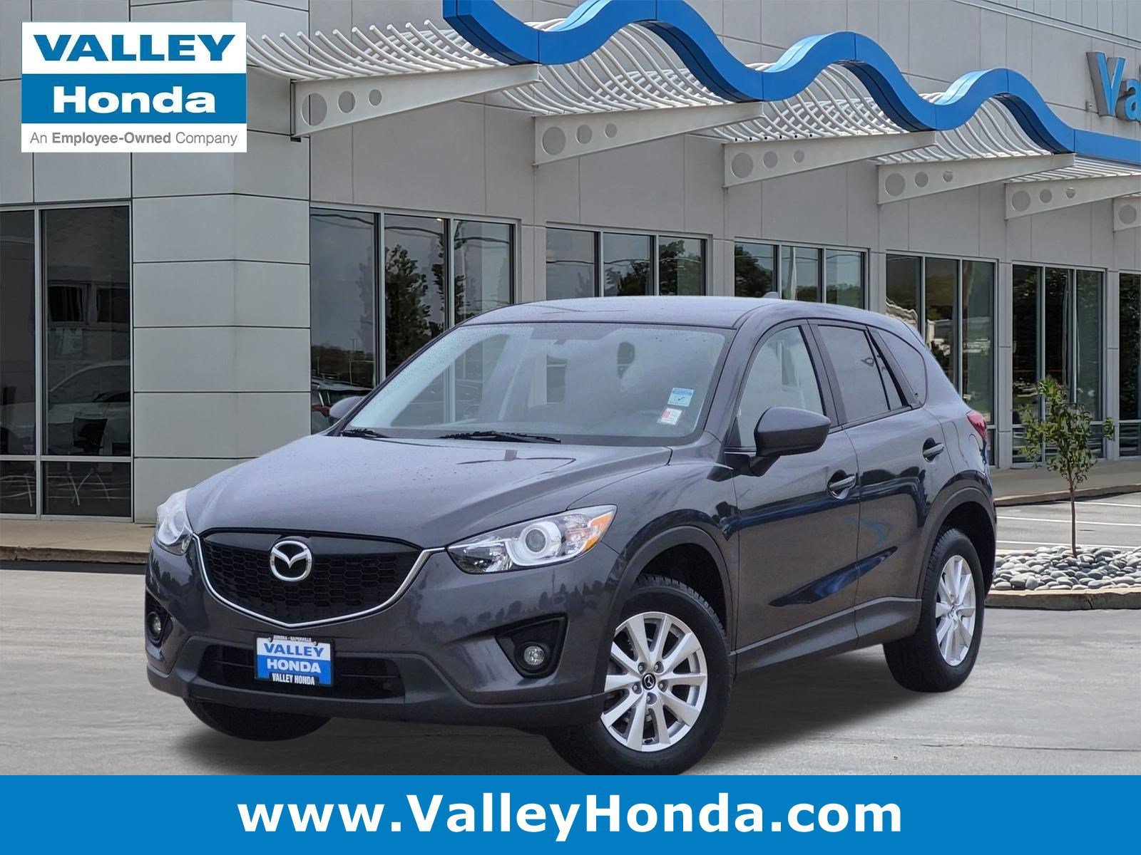 Used 2014 Meteor Gray Mica Mazda Touring AWD image 1